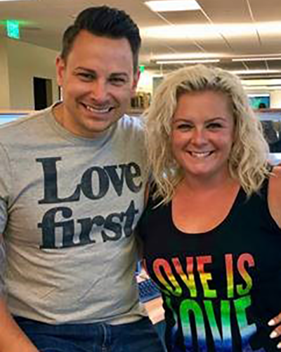 Carlos Pacheco and Heather Gibbs celebrating Pride month